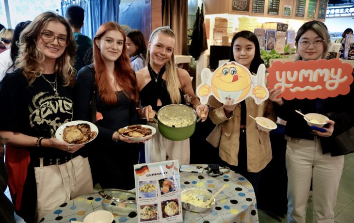 Leonie (2nd from the left) from Hamburg School of Business Administration in Germany enjoys sharing aspects of German culture with local students.